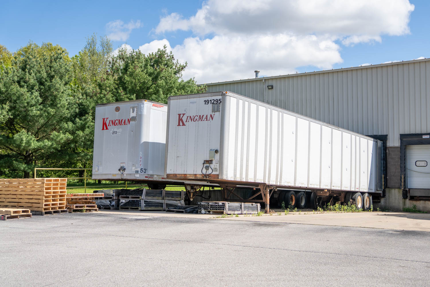 Two storage trailers at loading bay