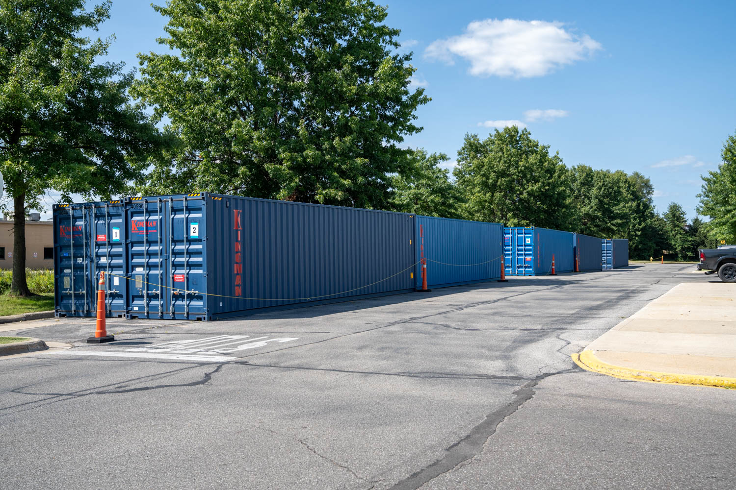 Multiple storage containers for retailer use